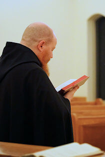 Monk reading book